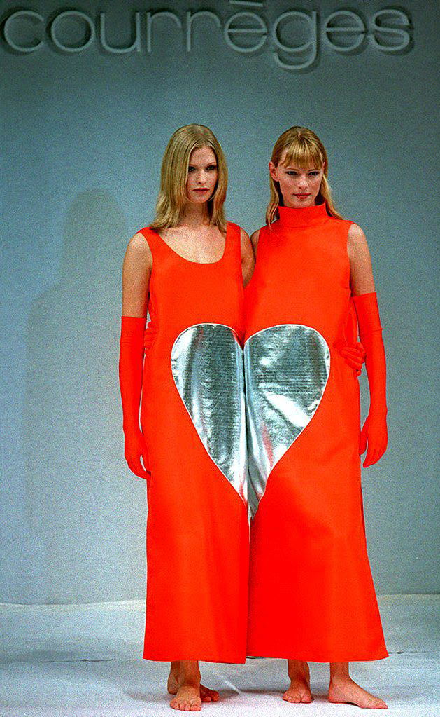 Two models present French fashion designer Courreges